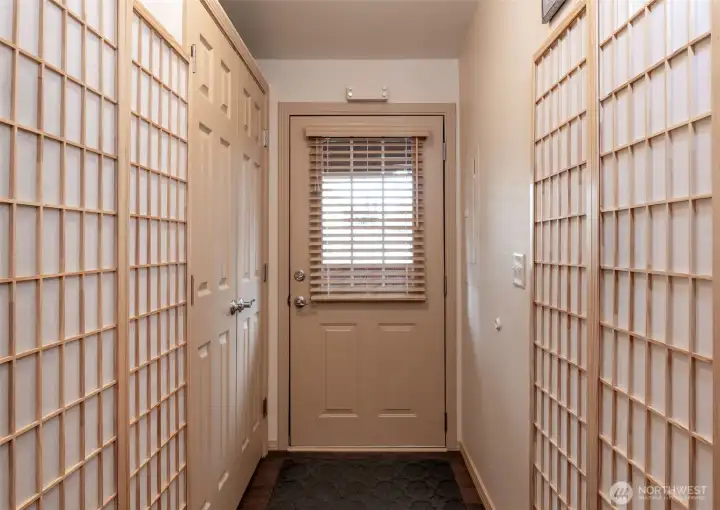 You are welcomed into the home through the artfully decorated entry hall.