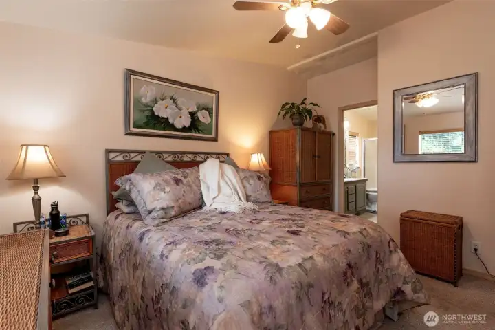 The primary suite has a private ensuite bathroom with walk-in shower.