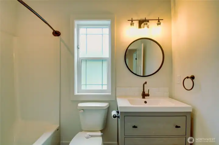 2nd floor hallway leading to full bath