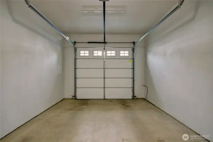 Single car garage with storage area, tankless hot water heater