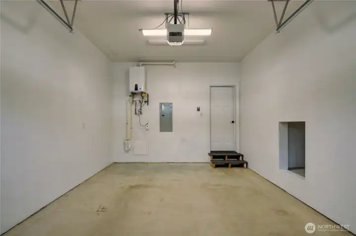 Single car garage with storage area, tankless hot water heater