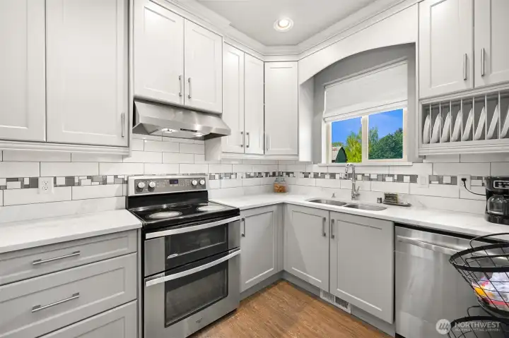 Full kitchen - fridge, oven/stove, dishwasher and sink.