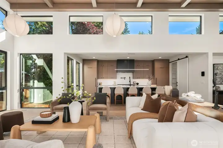 Sculptural designer lighting and built-in speakers enhance both ambiance and functionality.