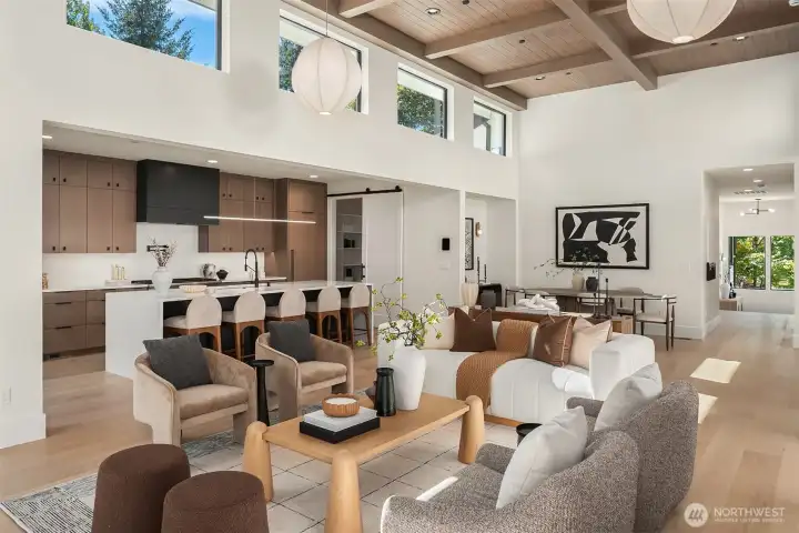 Sunlight pours in from every angle, filling the home with warmth, light, and an open, airy feel.