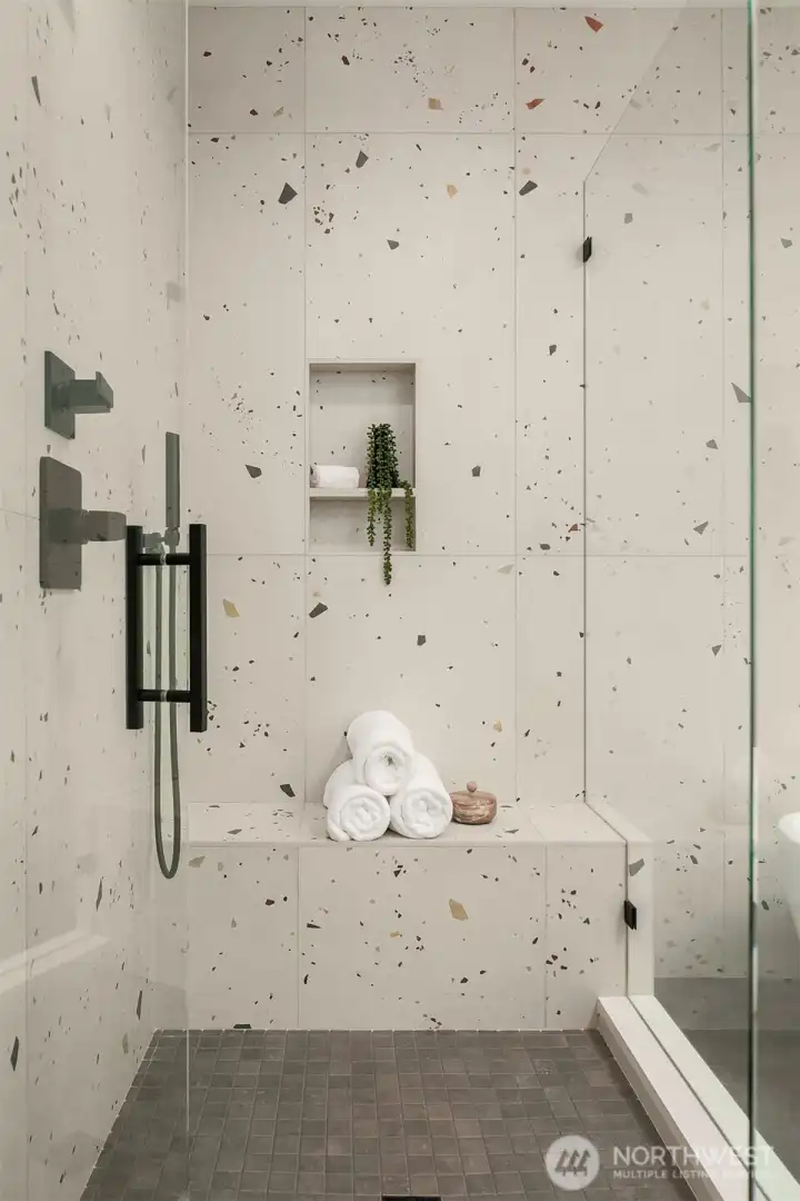 Oversized shower, thoughtofully designed for both function and artistic elegance.