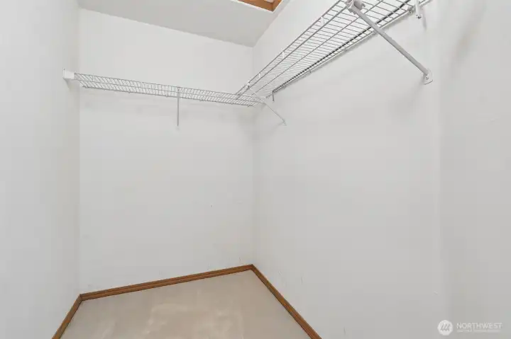 Primary walk-in closet Primary walk-in closet