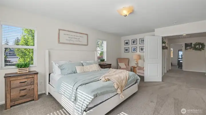 Primary bedroom with seating nook.
