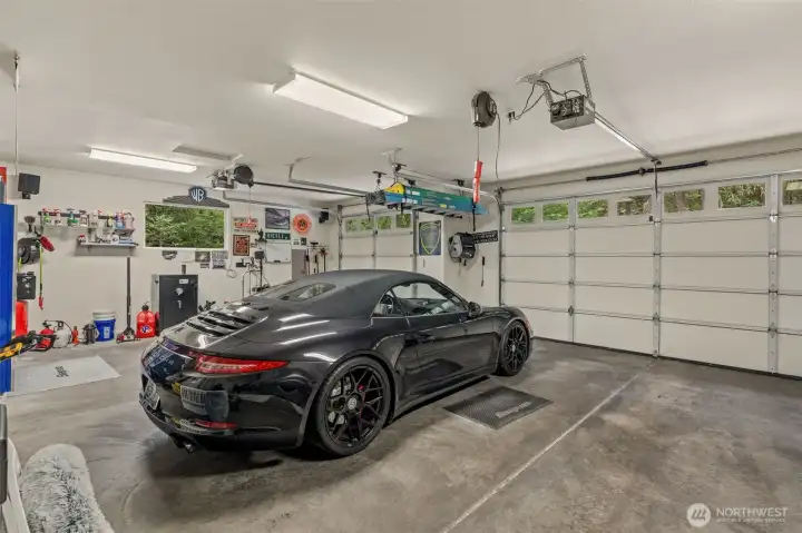 Spacious 3-car garage. (Porsche not included)