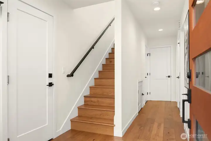 Entry on main level, door to garage is to the left