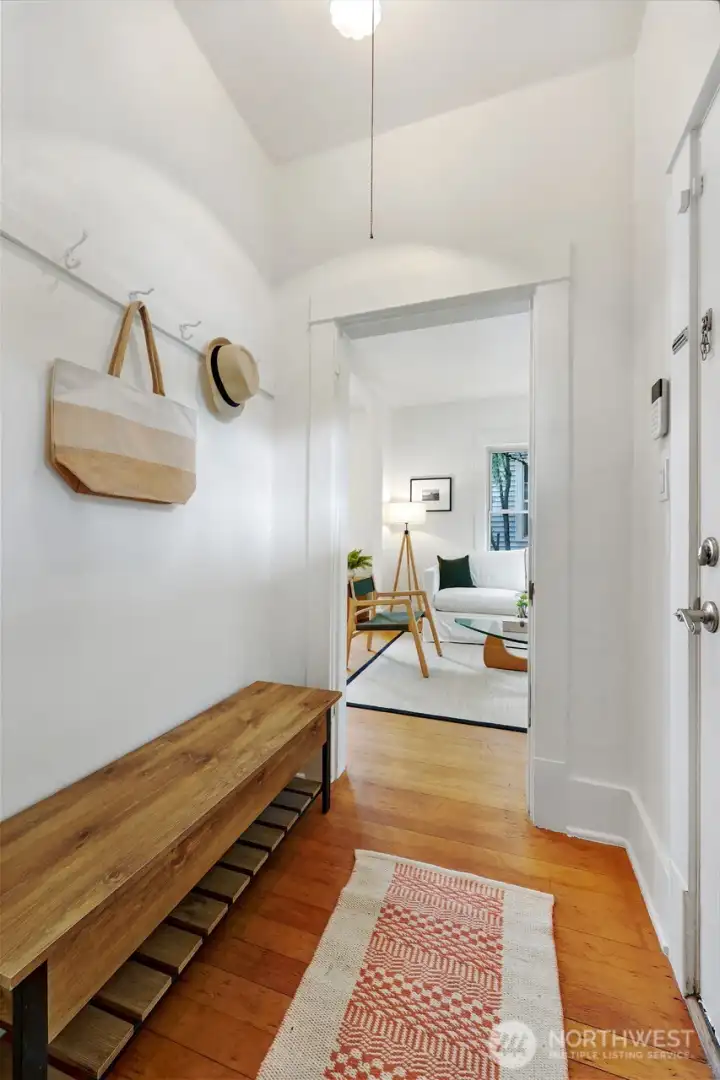 Step-in through a proper entry, with plenty of space for hanging coats or shoes.