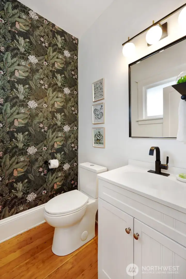 Tastefully designed half bathroom.