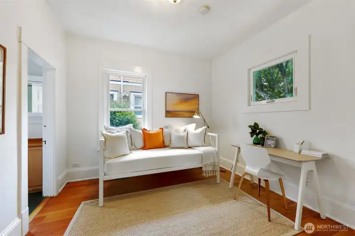 One of two spacious bedrooms, perfect as a bedroom or generous home office.