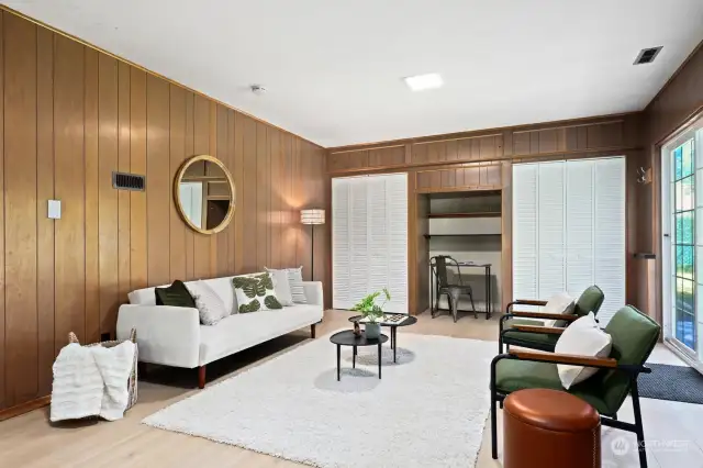 Love the rich wood panel walls AND new LVP flooring!