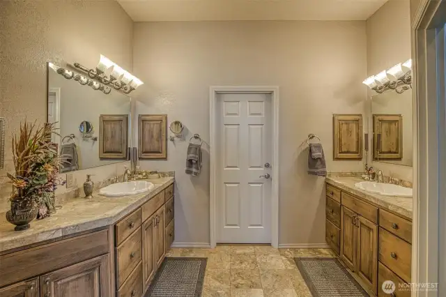 Main Bathroom with door to the large walk in closet.