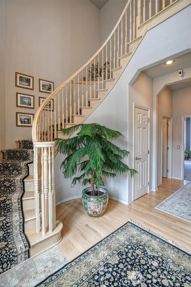 Entrance hallway with stairs to the upper level.