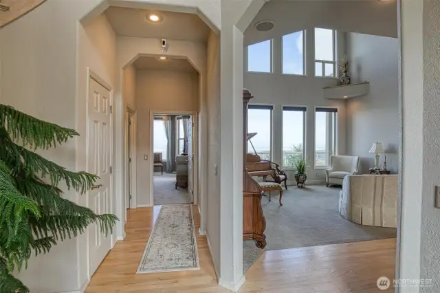 Entrance hallways to the main bedroom on the left and the living room to the right. So nice and bright.