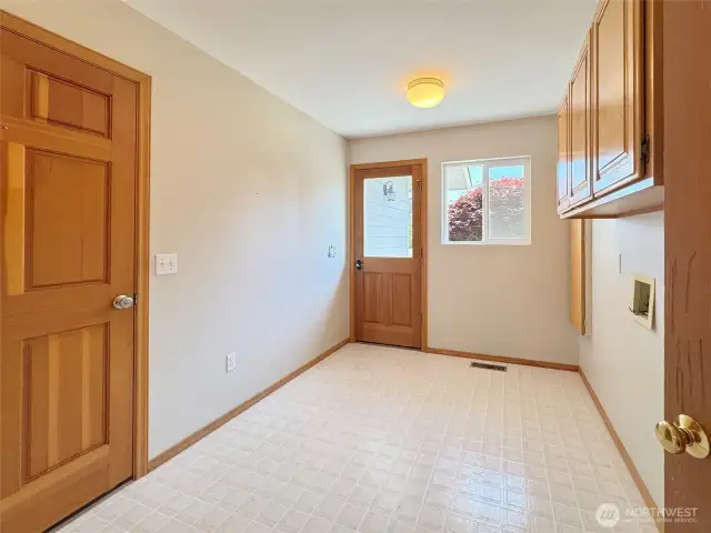 Laundry/ Mudroom Leads to Garage and Backyard