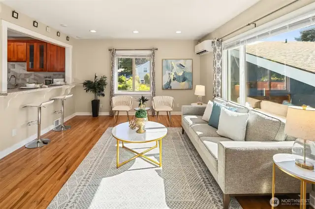 Beautiful hardwood floors and natural light enhance everyday living.