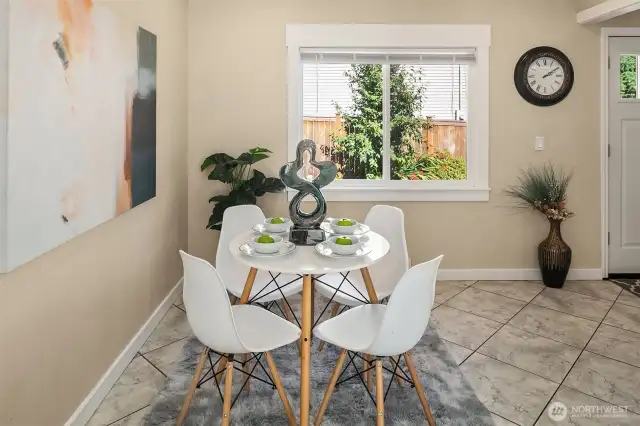 The dining room is open to both the living room and the kitchen for easy flow entertaining.