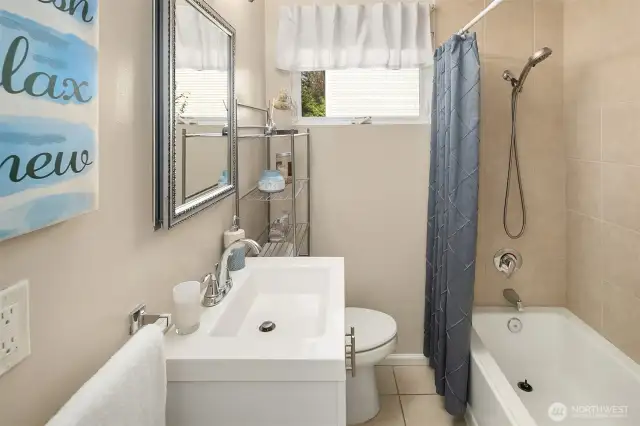 Updated bathrooms with modern fixtures and clean finishes.