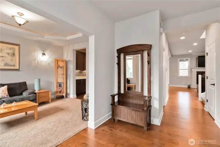 Welcoming entryway with beautiful engineered hardwood floors and seamless flow into the living spaces.