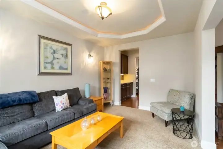 A front sitting room that sets the tone for warmth and comfort throughout the home.