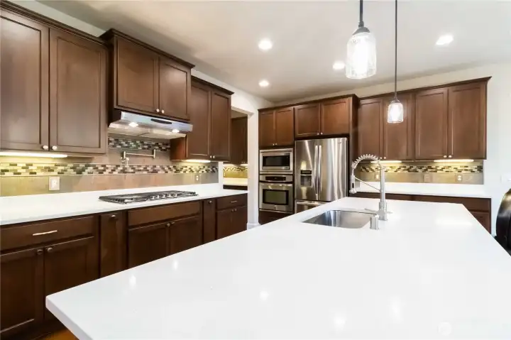 Gather around this expansive island—perfect for cooking, entertaining, and gathering.