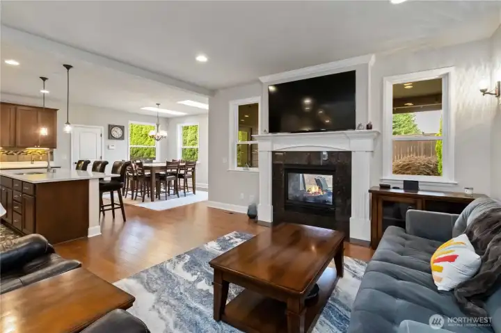 Living area features a sleek gas fireplace for warmth and convenience.