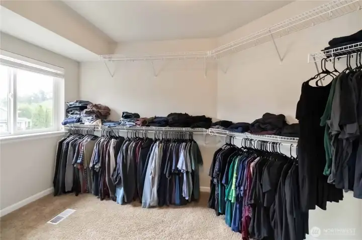 Expansive walk-in closet with plenty of space to keep everything organized in style.