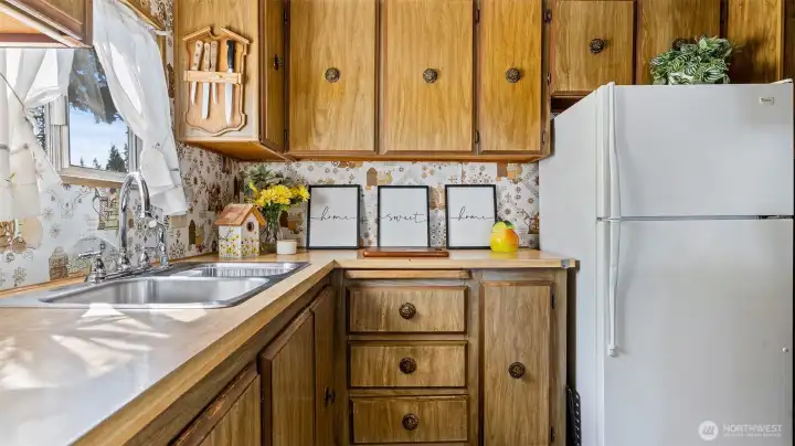 Tons of cabinets and countertop space!
