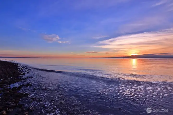Enjoy ever changing sunsets year-round from the community beach.