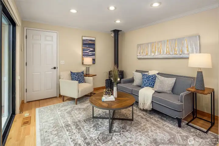 The laundry/mud room, accessed through the door, connects to the garage and provides generous pantry and coat storage.