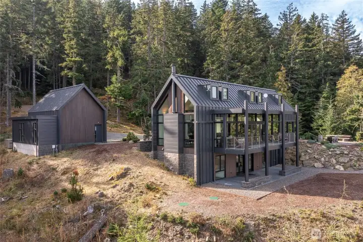 Aerial view of home and garage