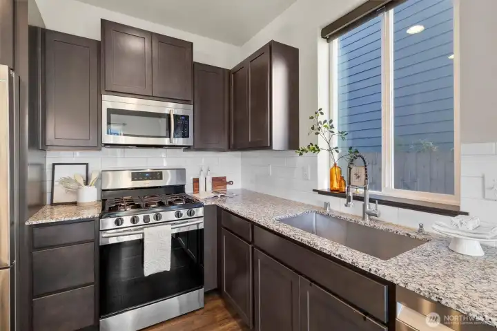 Kitchen with granite counter
