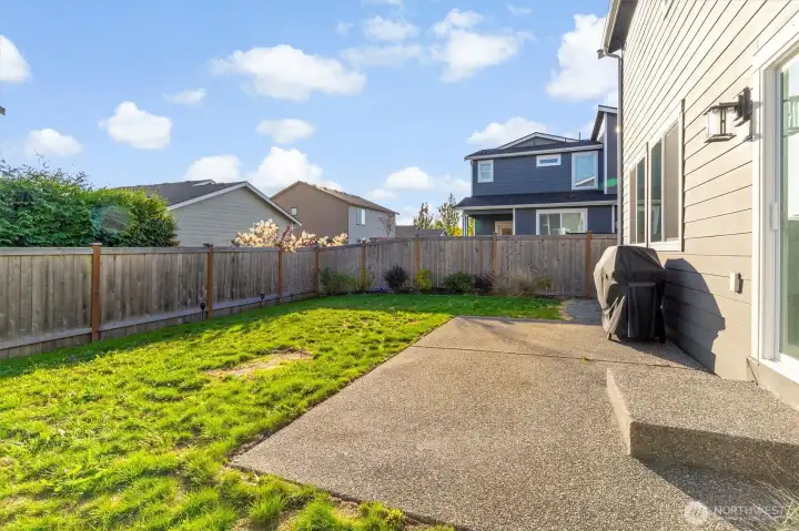 Fully fenced back yard and patio