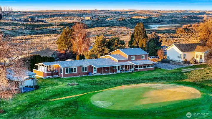 Peaceful golf course setting with sweeping fairway views