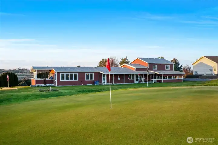 Watch golfers tee off right from your porch!