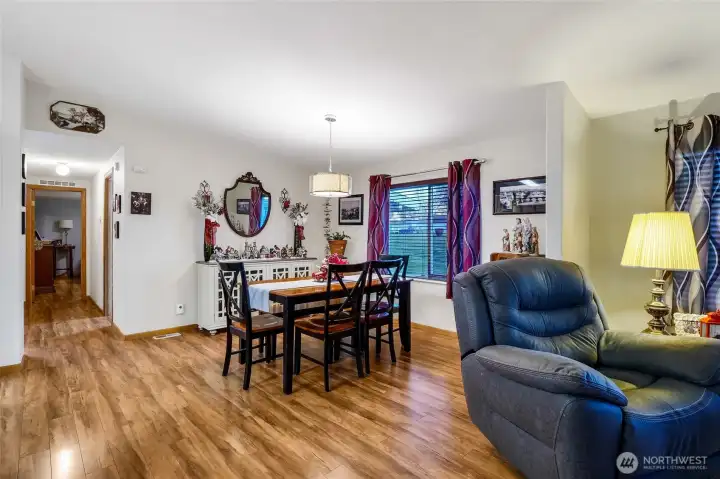 Seamless flow between living, dining, and kitchen areas