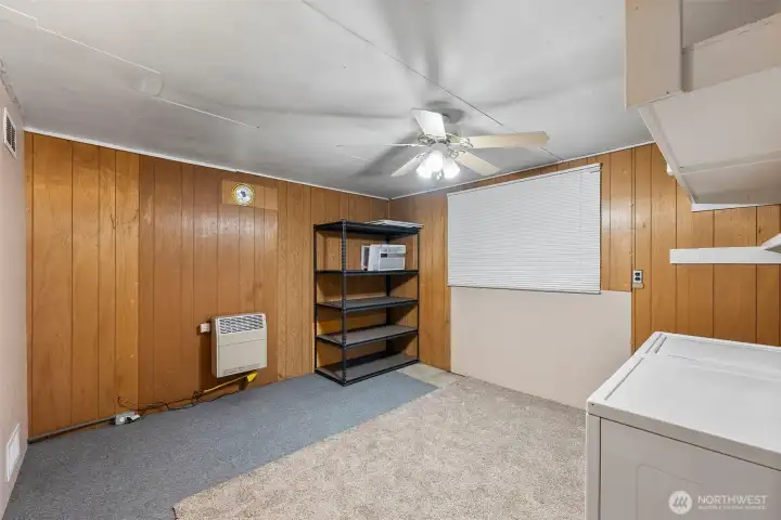 Garage is being used as a utility room and storage.