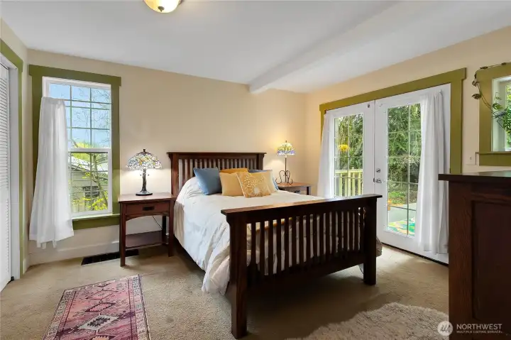 Main Floor Bedroom with french doors to the deck.
