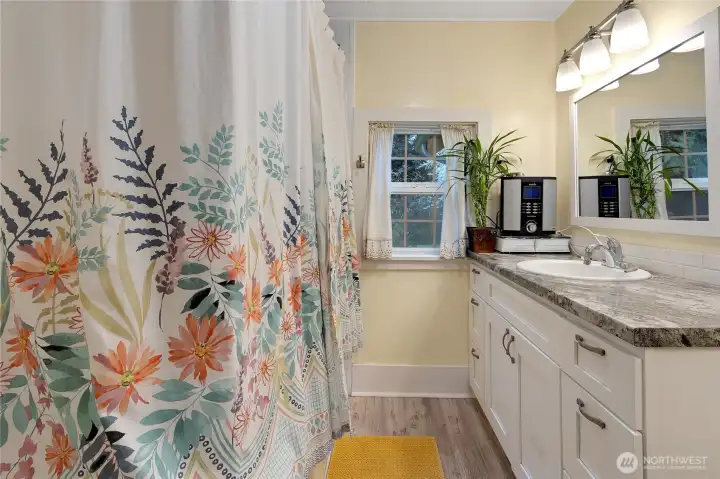 Updated main floor bathroom with a deep tup for soaking!