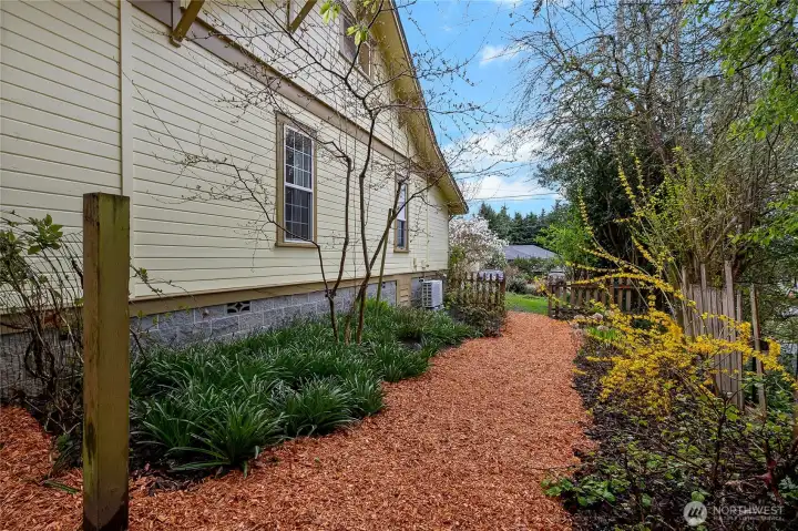 Beautiful garden pathway from front to back yard.