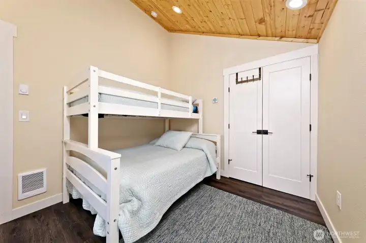 Main level bedroom and closet.