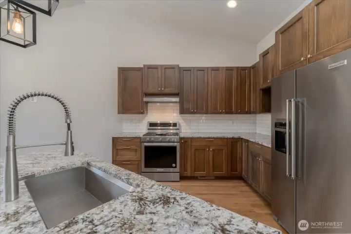 Kitchen with granite countertops.