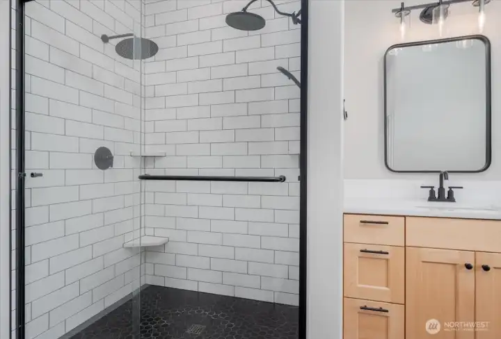 Large double-headed walk-in shower.