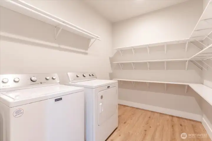 Laundry room with lots of storage.