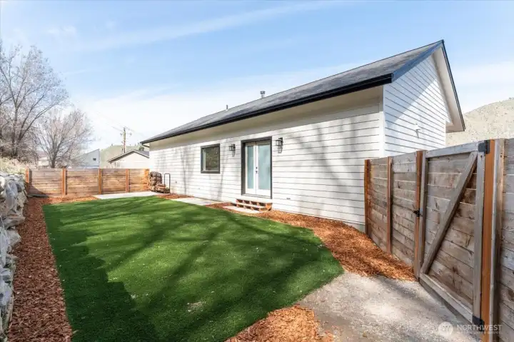 Low maintenance turf in the back yard.