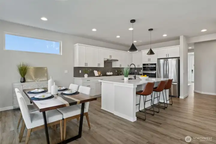 Photos are of another home in the community and are for illustration purposes only to reflect typical finishes.  May depict seller enhancements.  Colors and options may vary.