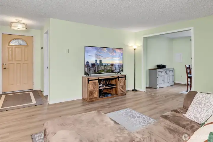 Family room view towards entry and dining room