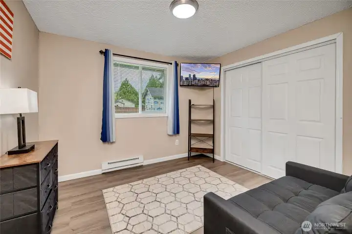 Bedroom with window towards the backyard